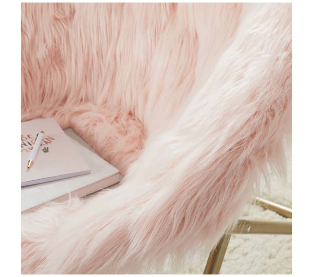 Shop Himalayan Blush Faux Fur Hang A Round Chair online Pottery